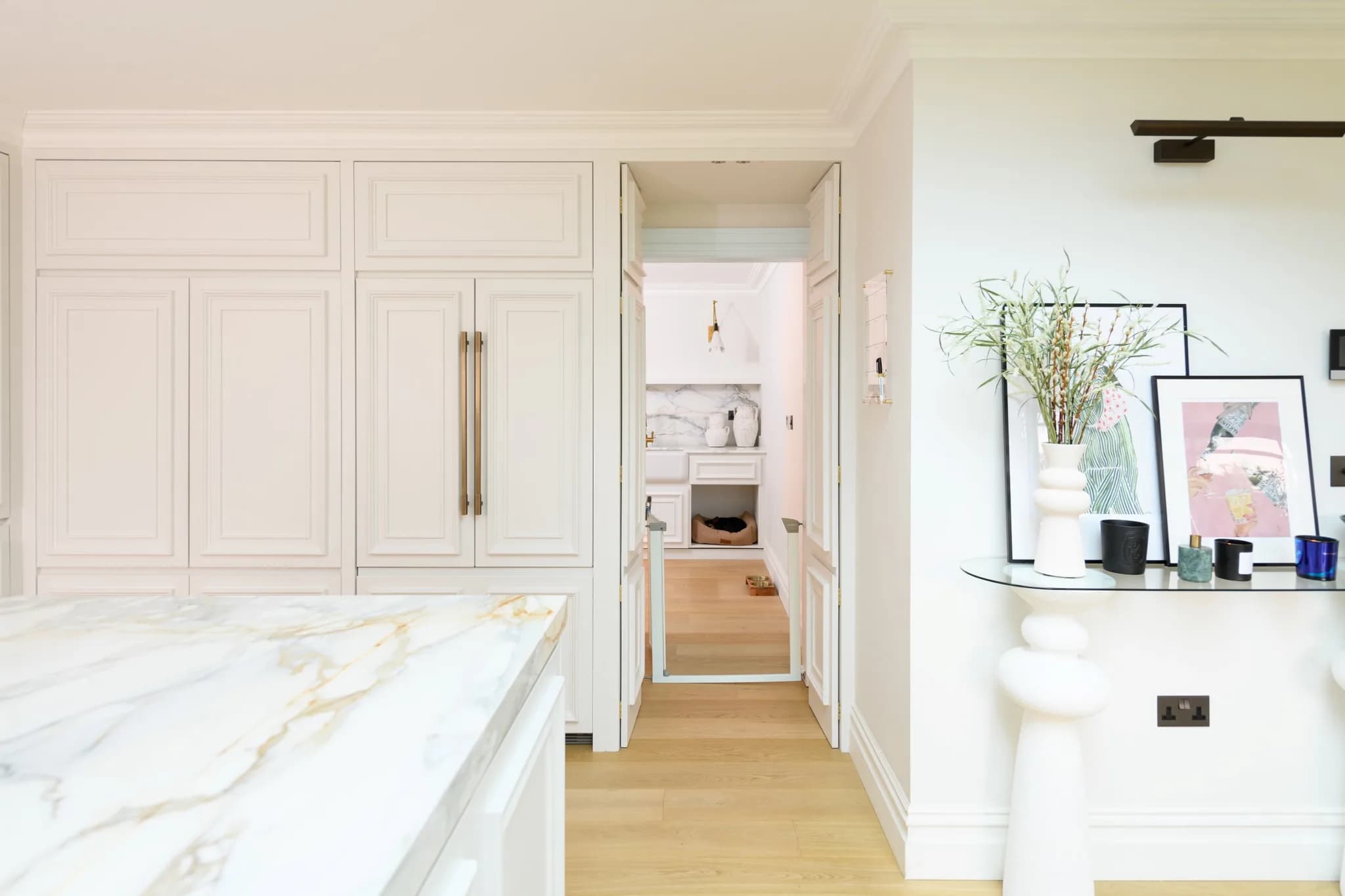 Transforming Handmade Cabinets into Secret Utility Room Entrances