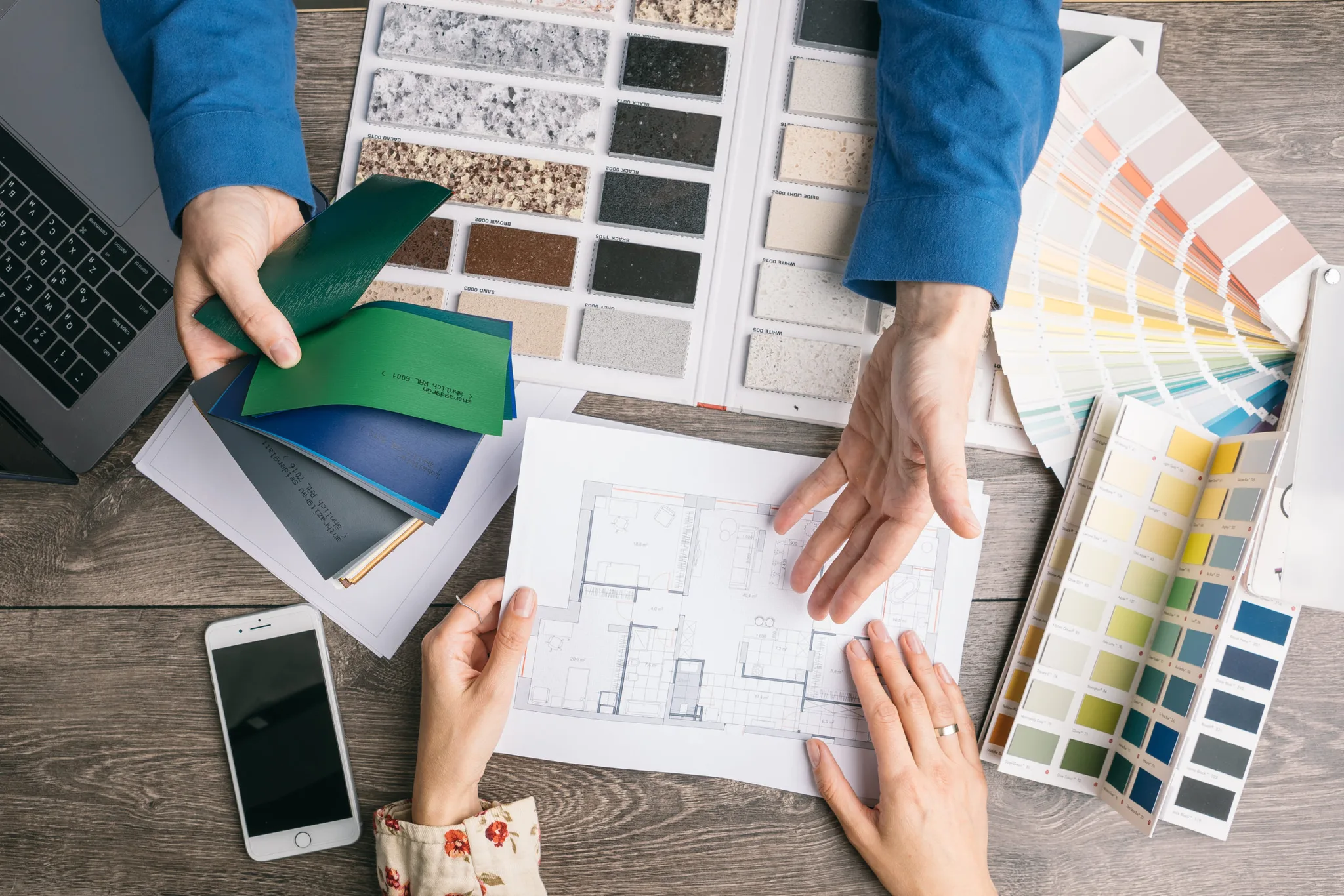 communication designer and customer. choice of colors and materials. selection of design elements for new interior repair. Work of designer and client